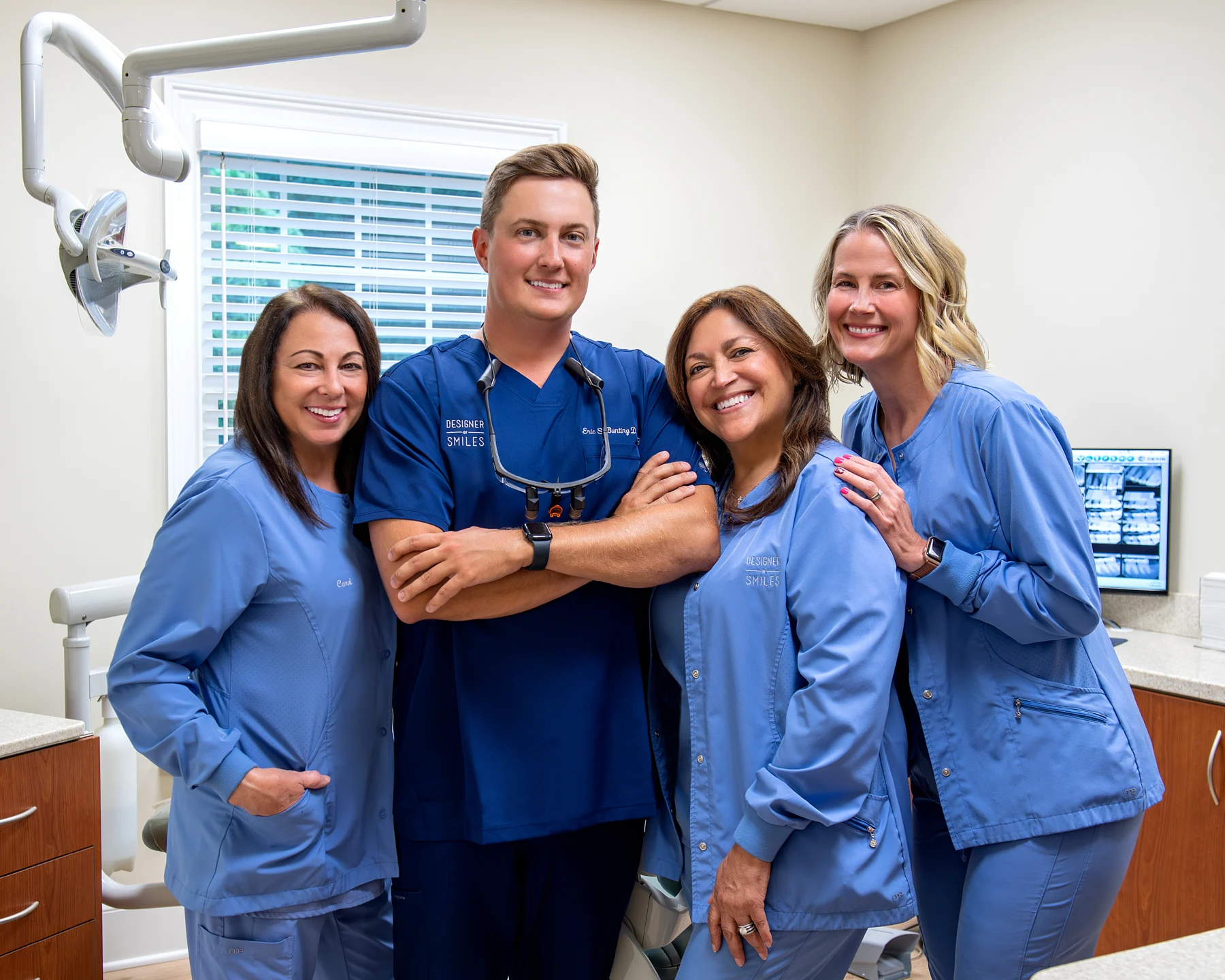 Dr. Eric Bunting with expanded function dental assistants