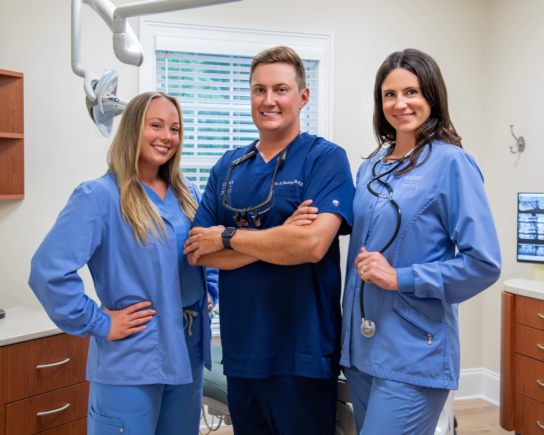 Dr. Eric Bunting with registered dental hygienists